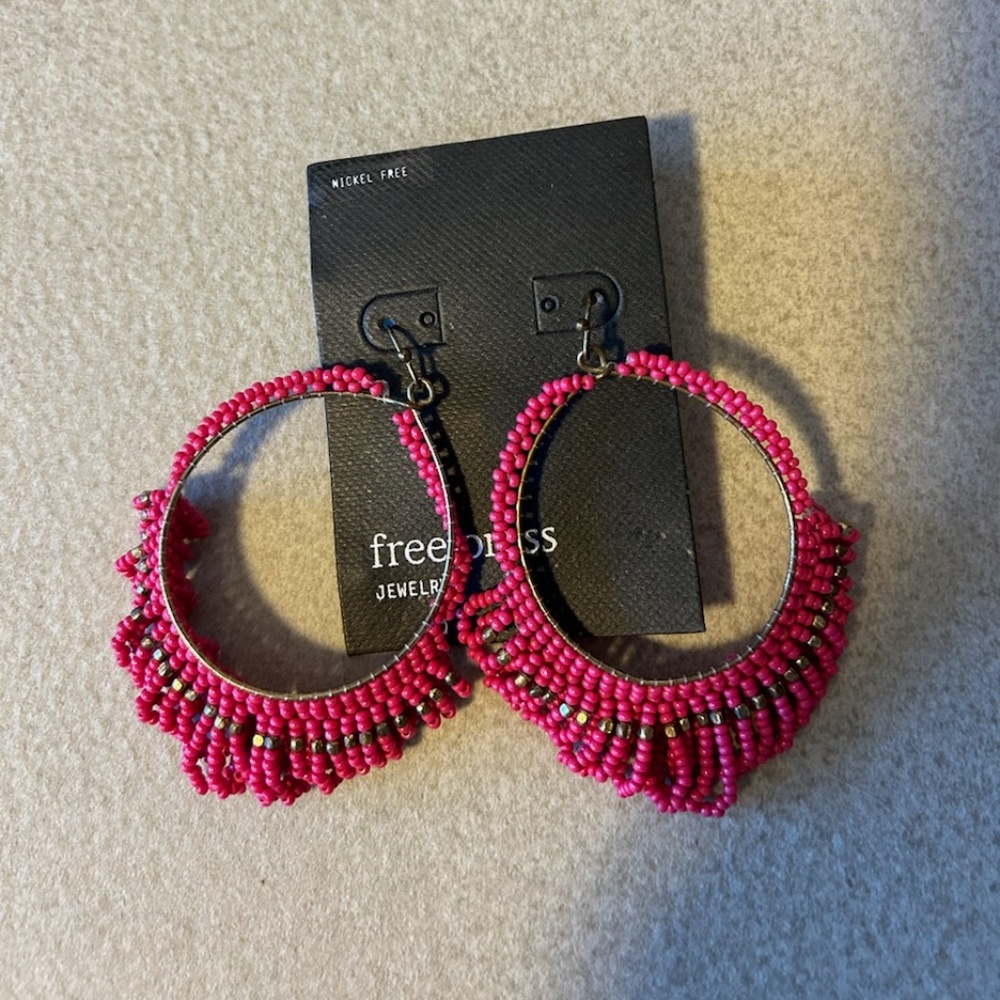 Hot pink beaded hoop earrings